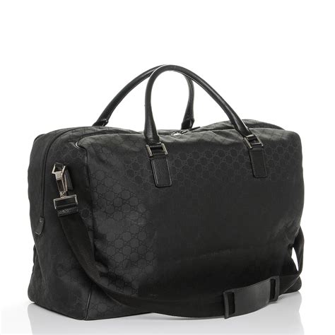 gucci duffle bag black|Gucci monogram large duffle.